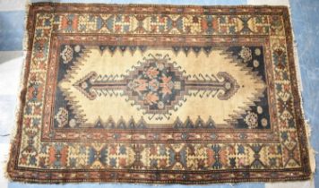 A Vintage Patterned Woollen Rug, 174x117cms