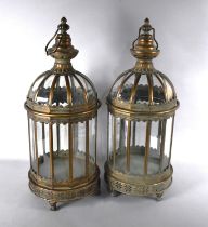 A Pair of Patinated Copper Cylindrical Lanterns with Pierced Base Borders and Claw Feet, 58cms High