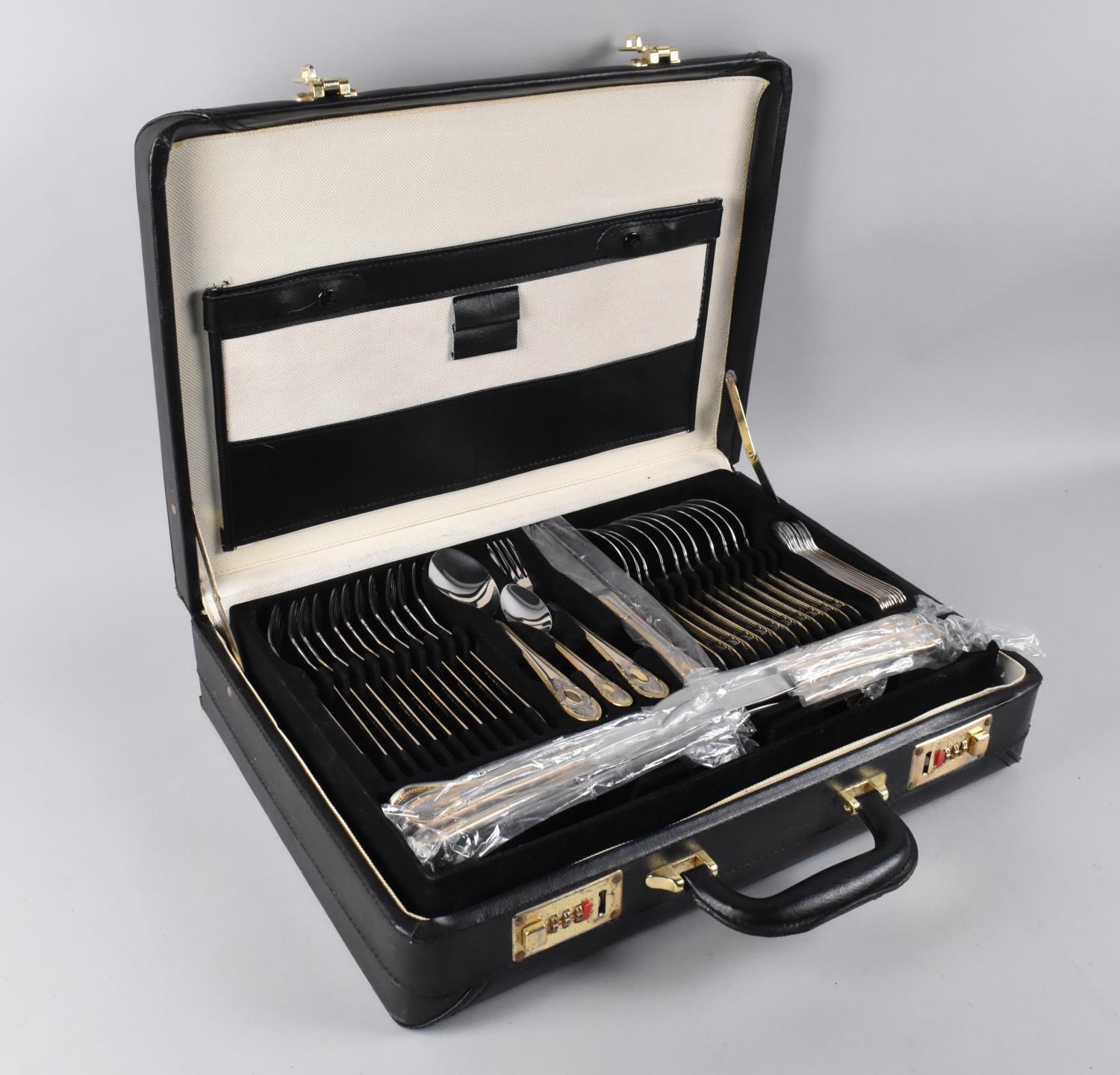 A Mid 20th Century Continental Canteen of Stainless Steel Cutlery in Combination Lock Carrying Case