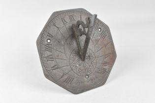 A Cast Bronze Horizontal Sundial, Inscribed "Tyme Flyes", 15.5cm diameter