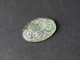 A Chinese Rock Crystal Oval Carving with Archaic Design and Scroll Border, 3cm