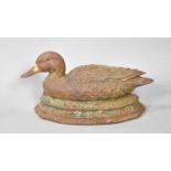 A Cast Iron Doorstop in the form of a Nesting Duck by Wright Studios, 39cms Long