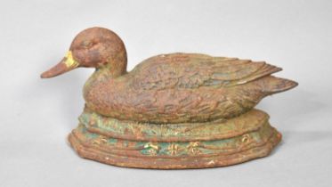 A Cast Iron Doorstop in the form of a Nesting Duck by Wright Studios, 39cms Long
