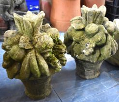 A Pair of Composite Stone Garden Ornaments Modelled as Basket of Fruit, 37cm high