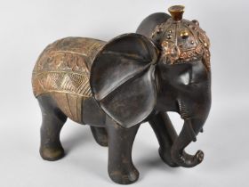 A Modern Gilt Decorated Study of an Elephant, 40cms Long and 38cms High