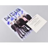 A Signed Photograph by All Eight Main Cast Members of NCIS together with Certificate of Authenticity
