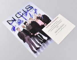 A Signed Photograph by All Eight Main Cast Members of NCIS together with Certificate of Authenticity