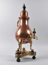 A Copper Spirit Kettle with Brass Handle, Tap and Tripod Support, Brass Stand with Burner Overall