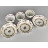 Three 18th Century Porcelain Tea Bowls and Saucers Decorated with Floral Garland Bands