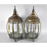 A Pair of Copper Patinated Lanterns with Hinged Lid and Hoop Carrying Handles, 48cms High