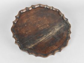 An Edwardian Circular Tray with Pie Crust Rim, 30cms Diameter