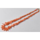 A String of Red Coral Beads of Branch Form, 45cms Long, 22.4gms