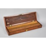 A Late Victorian/Edwardian Mahogany Box Containing Wooden 12" Rulers, 34cms Wide