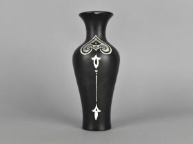 A Shelley Art Nouveau Style Vase Decorated with White and Silver Motifs on Black Ground, 17cm high