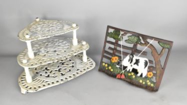 A White Painted Cast Metal Three Tier Pan Stand Together with a Cast Metal Recipe Holder with Cow