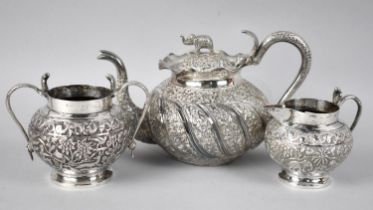 An Indian Low Grade Silver Three Piece Tea Service with Cobra Handle and Elephant Finial to Teapot