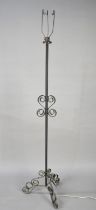 A Wrought Iron Tripod Standard Lamp Base