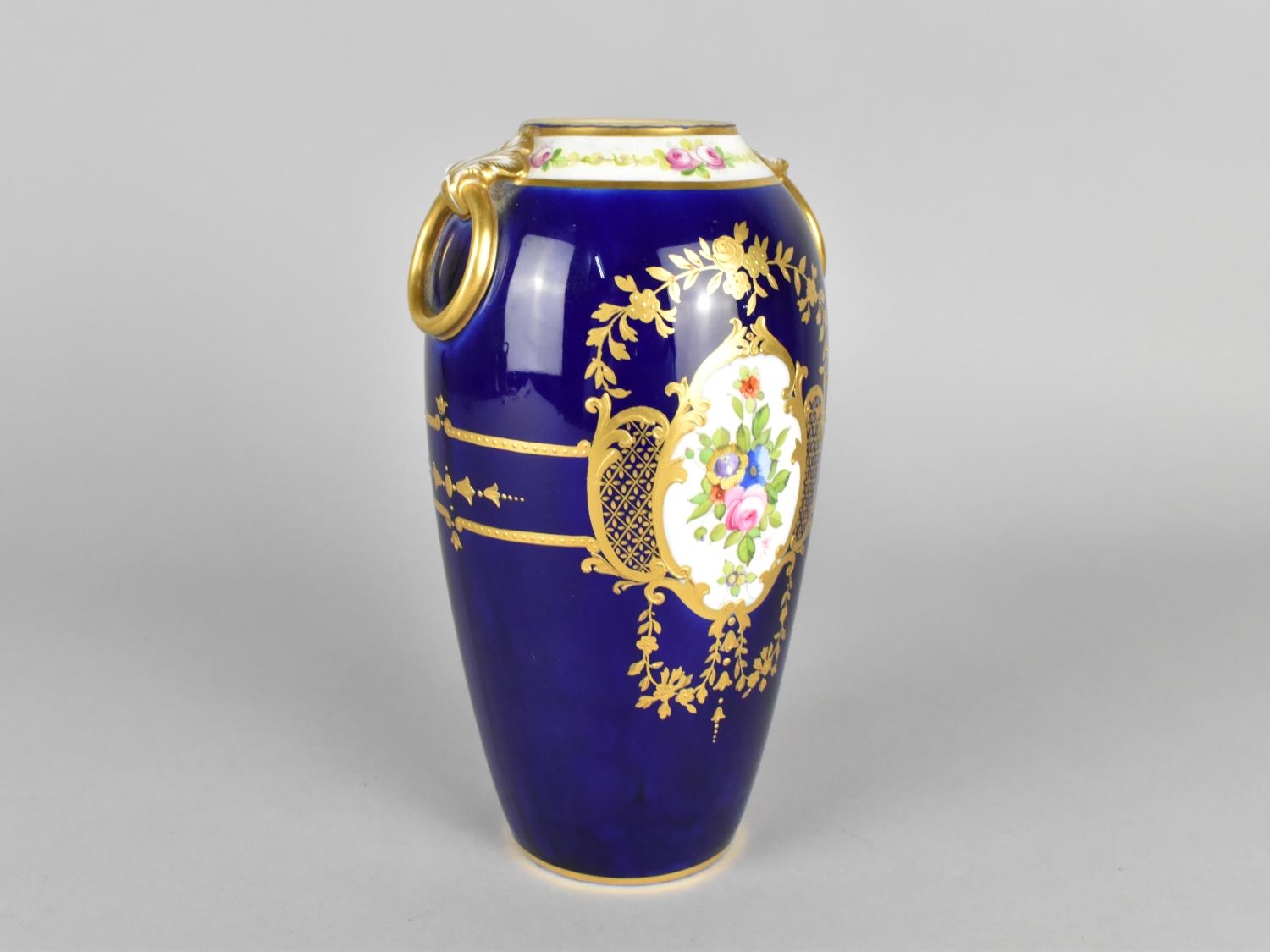 A Mintons Vase Decorated with Hand Painted Floral Cartouches on Blue Ground with Gilt Detailing, the - Image 3 of 4