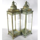 A Pair of Green Patinated Brass Rectangular Lanterns on Four Claw Feet, Hinged Top, 53cms High