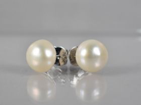 A Pair of Large White Pearl Earrings, 13mm Diameter, Backs Stamped 14TK