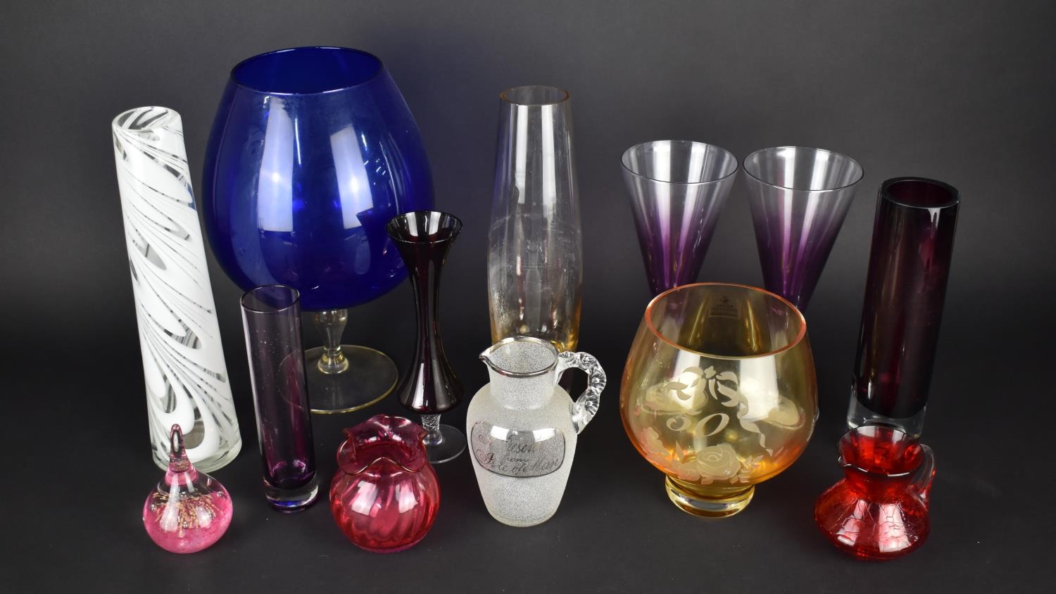 A Collection of Various Coloured Glass to Include Hand Blown Jug Inscribed "A Present From Isle of