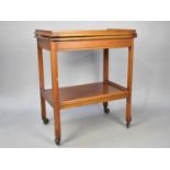 A Mid 20th Century Lift and Twist Two Tier Trolley, 61cms Wide