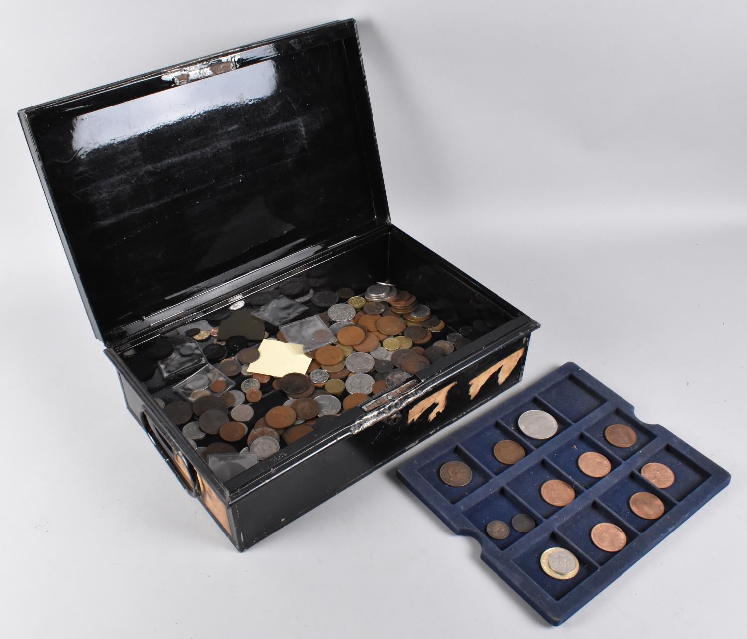 A Black Painted Metal Cash Tin Containing Various Silver Plated and Copper Coinage in