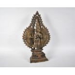 A Large Indian Patinated Bronze Temple Altar Piece Depicting Standing Deity with Many Heads and