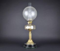 A Late Victorian/Edwardian Oil Lamp with Ribbed Column Support, Clear Glass Reservoir and Etched