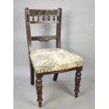 An Edwardian Ladder Back Side Chair with Carved Top Rail
