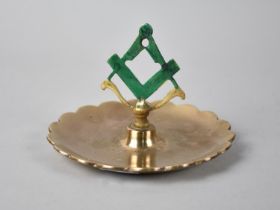 A Brass Circular Ashtray with Wavy Rim and Masonic Emblem, 13cms Diameter