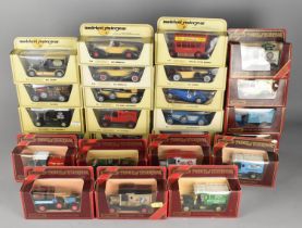 A Collection of Various Models of Yesteryear Diecast Vehicles in Original Blister Pack