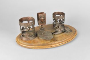 A French Bronze Desktop Stand with Two Cylindrical Pierced Containers, Matchbox Holder, Shallow Oval