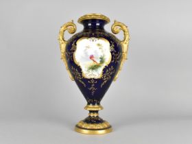 A Coalport Pedestal Vase with Scrolled Twin Handles Decorated with Hand Painted Cartouches on Blue