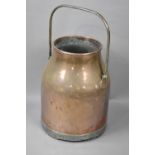 A Vintage Copper Milk Unit Base with Iron Loop Carrying Handle, 39cms High