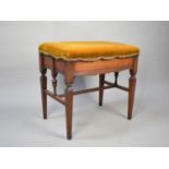 An Edwardian Mahogany Framed Lift Top Piano Stool on Tapering Square Supports, Upholstered Seat,