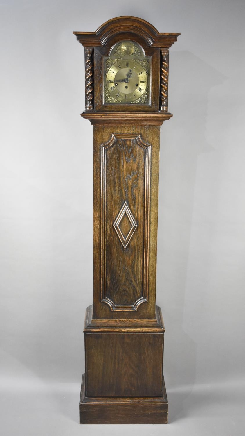 A Mid 20th Century Oak Grandmother Clock with Brass Tempus Fugit Arched Dial, Westminster Chime