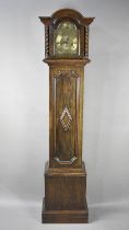 A Mid 20th Century Oak Grandmother Clock with Brass Tempus Fugit Arched Dial, Westminster Chime