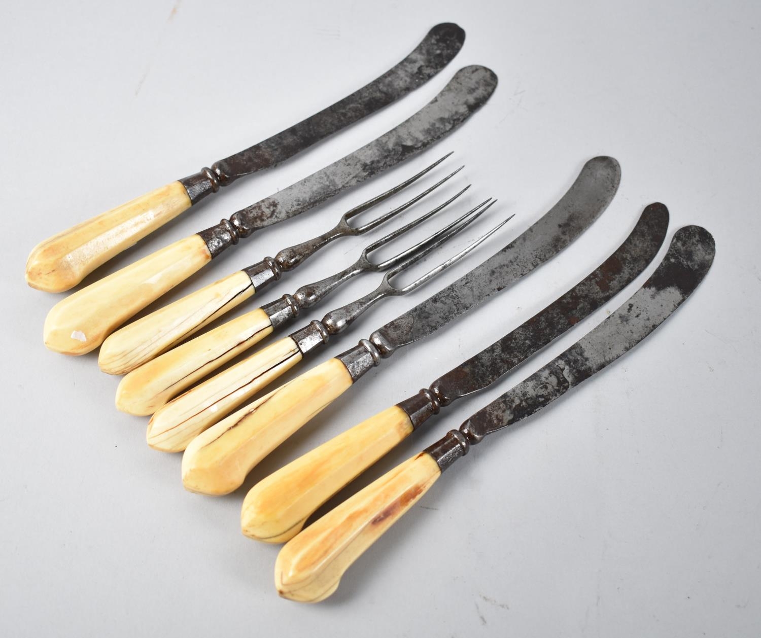A Collection of Three Early Two Prong Forks and Five Matching Bone Handled Knives