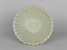 A Chinese Celadon Bowl of Reeded Form, 18cm Diameter