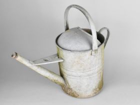 A Galvanized Watering Can