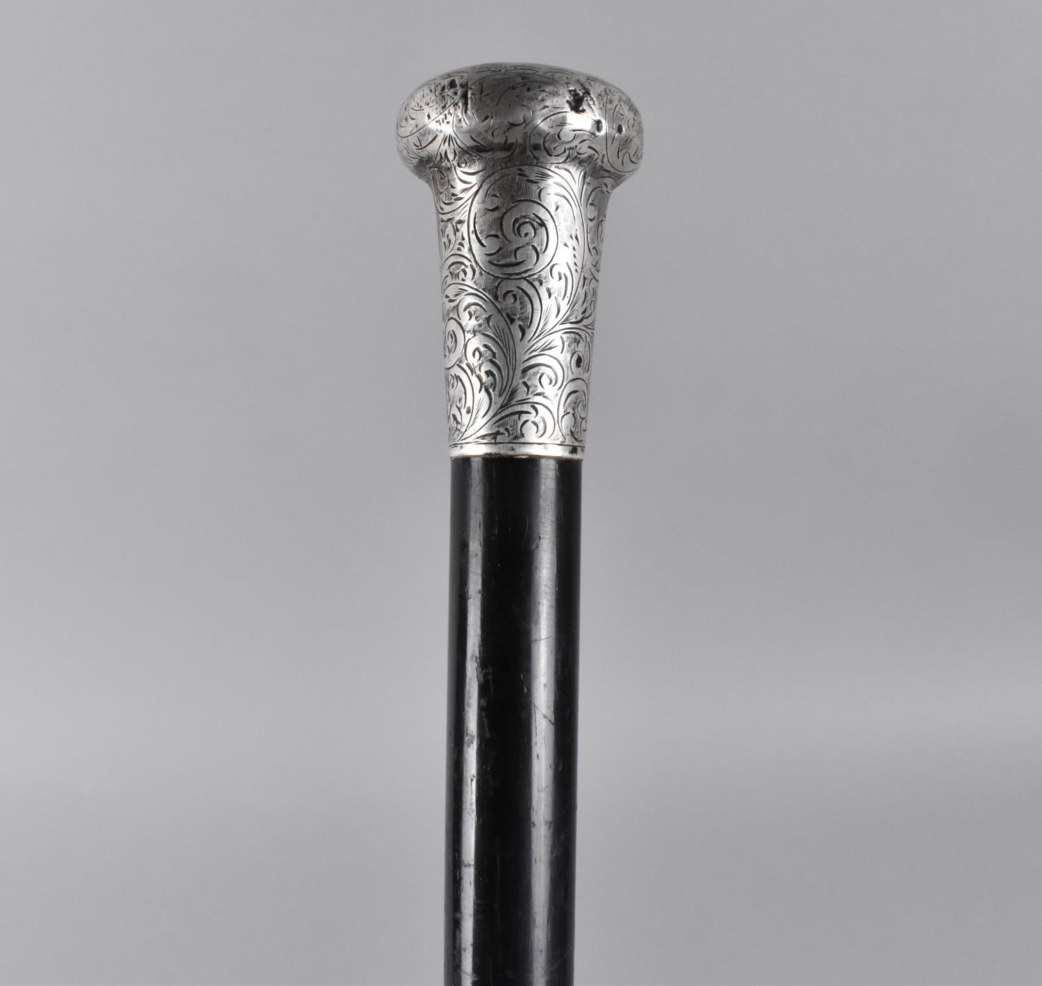 An Edwardian Silver Topped Ebony Walking Cane by Johnathan Howell, Hallmarked Birmingham 1921, 90cms