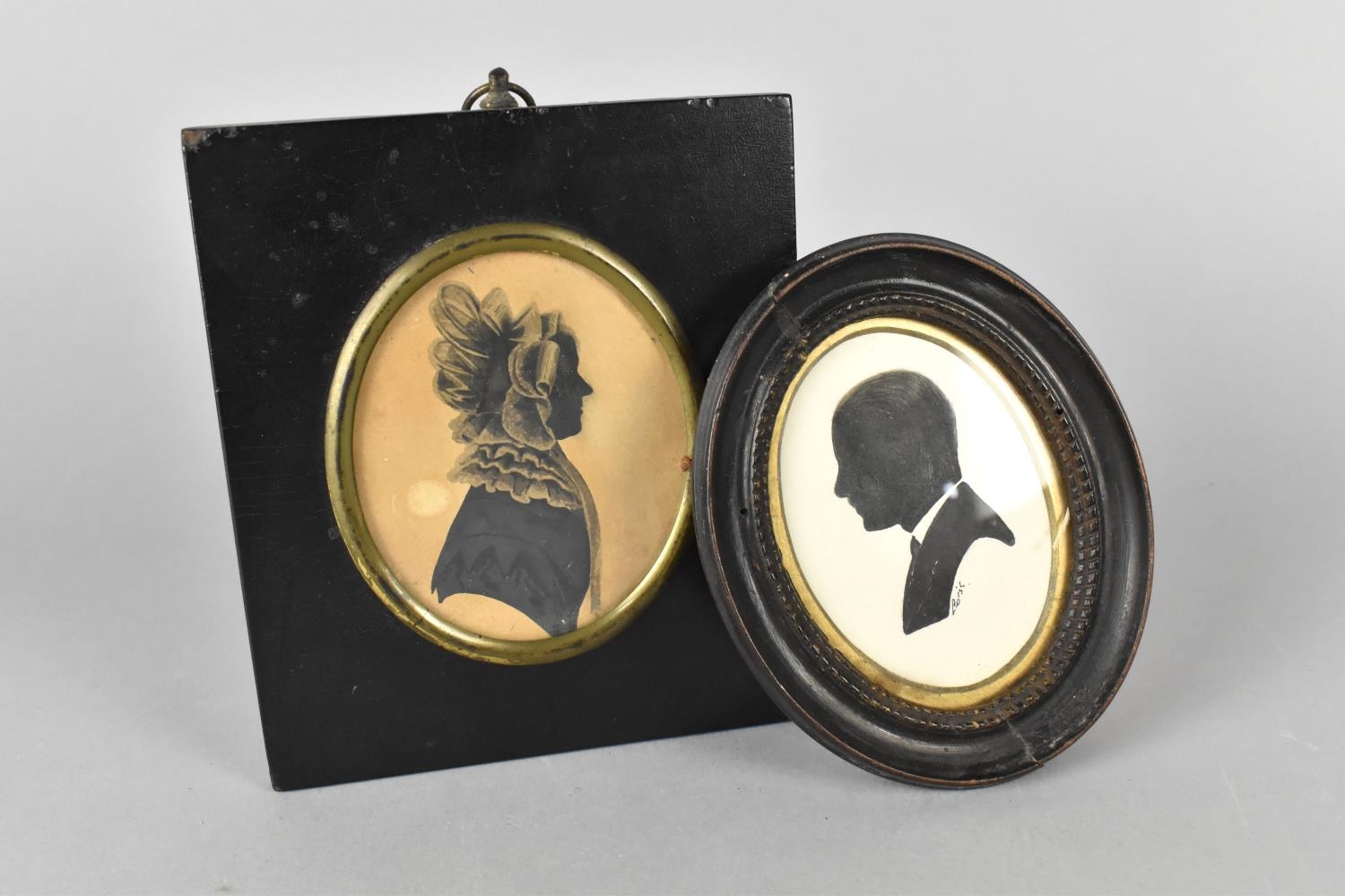 Two Late 19th Century Pen and Ink Silhouettes of Gent and Lady with Bonnet