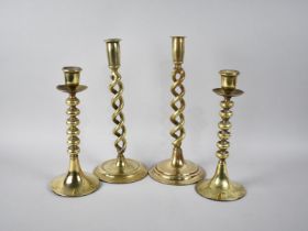 A Pair of Brass Open Spiral Candlesticks and a Smaller Pair, Tallest 30cms High