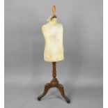 A Late Victorian/Edwardian Dress Makers Dummy for a Child on Wooden Tripod Stand with Turned