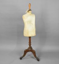 A Late Victorian/Edwardian Dress Makers Dummy for a Child on Wooden Tripod Stand with Turned