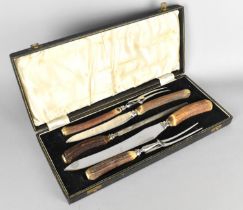 An Edwardian Cased Five Piece Carving Set with Antler Handles