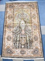 A Silk Kashan Hand Made Rug, 198x120cms
