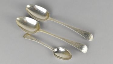 Two Georgian Silver Serving Spoons with Bright Cut Decoration Together with a Victorian Spoon, 164g