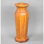 A Modern Wooden Stick Stand in the Form of an Octagonal Vase, 60cms High